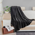 flannel blanket black sofa