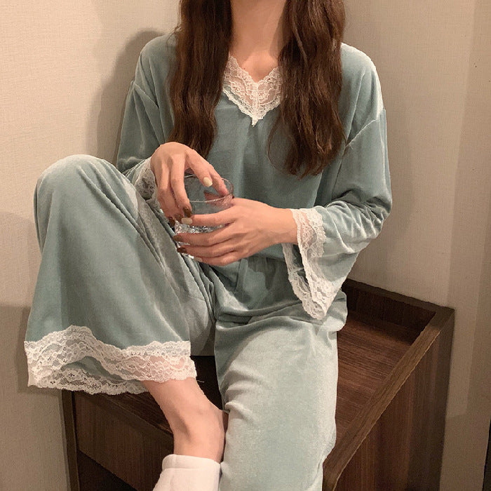 green lace-trim velvet pajama set worn